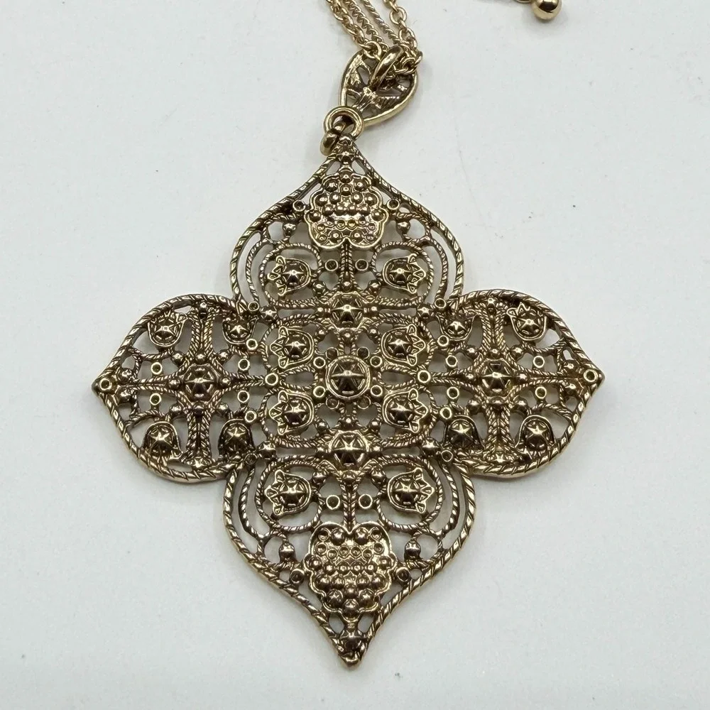 Charming Charlie ornate gold